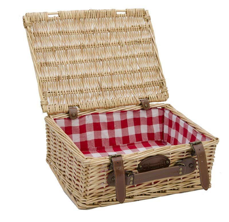 Empty wicker basket with red and white fabric